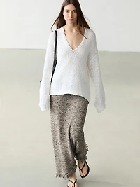 Total look knit skirt with fringing