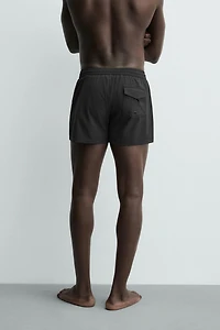 SHORT STRUCTURED SWIMSUIT