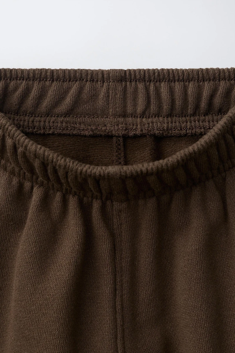 EMBROIDERED BARREL PLUSH PANTS