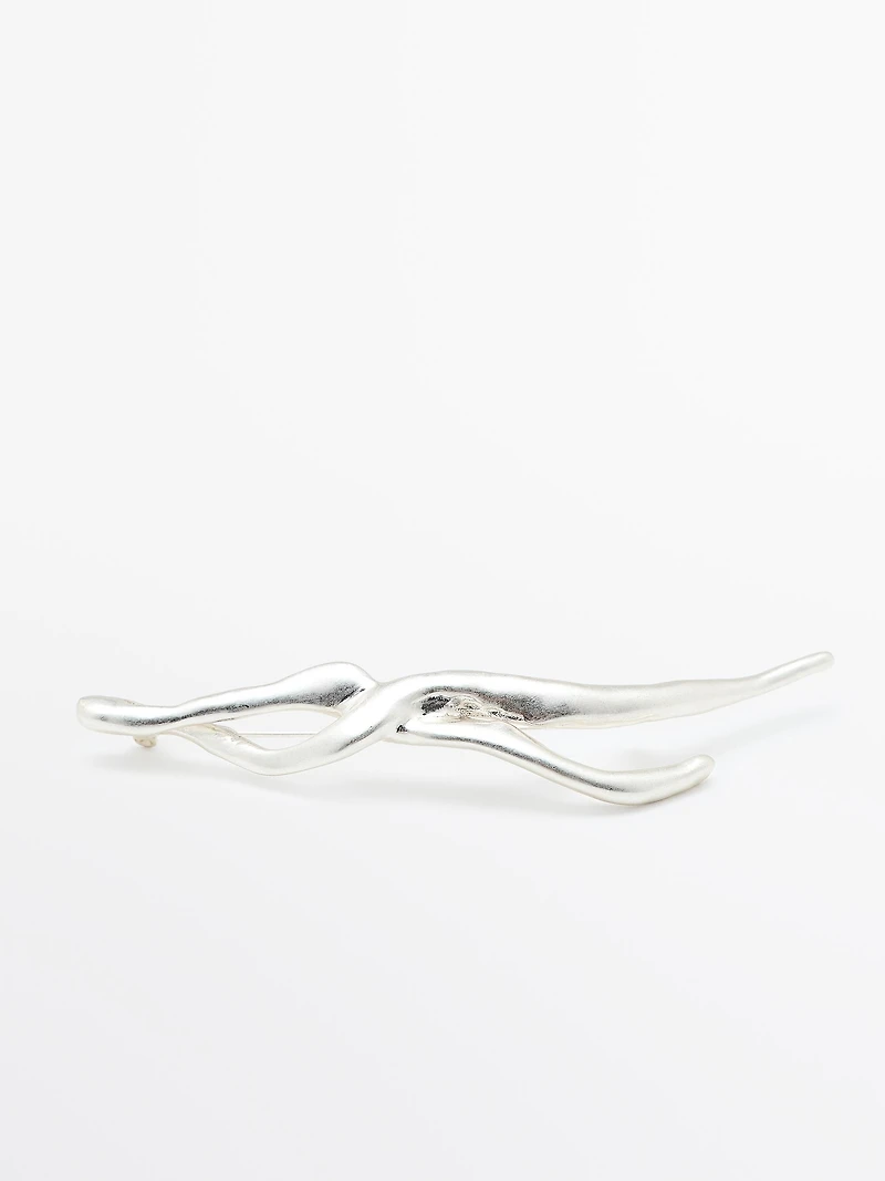 Broche métallique abstraite