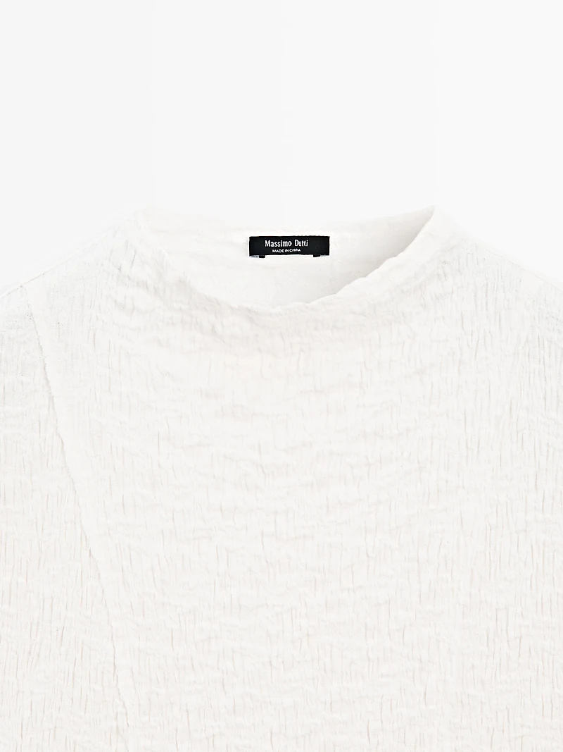 Sleeveless top with gathered detail