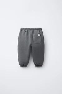 WASHED EFFECT JOGGER PANTS WITH LABEL