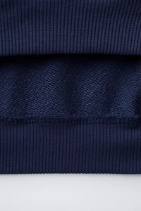 EMBROIDERED ANIMAL STRIPED POLO SWEATSHIRT