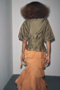 PLEATED WAIST MIXED KNIT BLOUSE