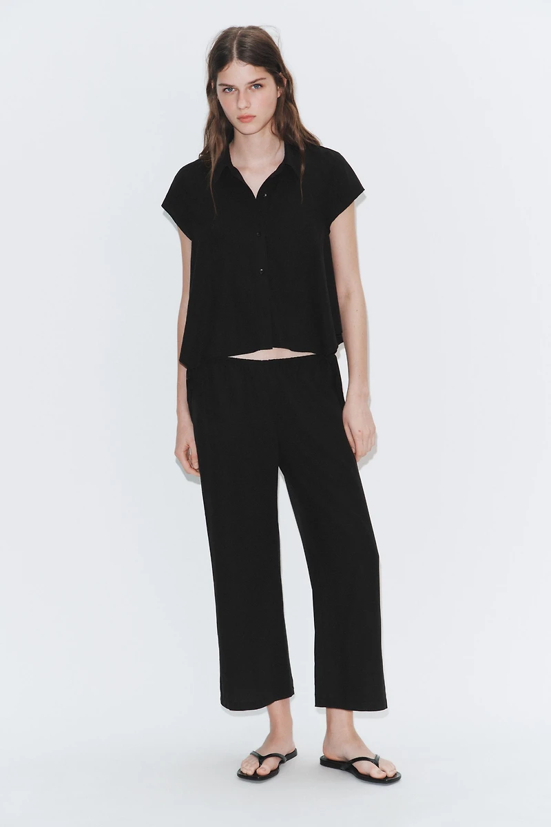 ASYMMETRICAL FLOWY SHIRT
