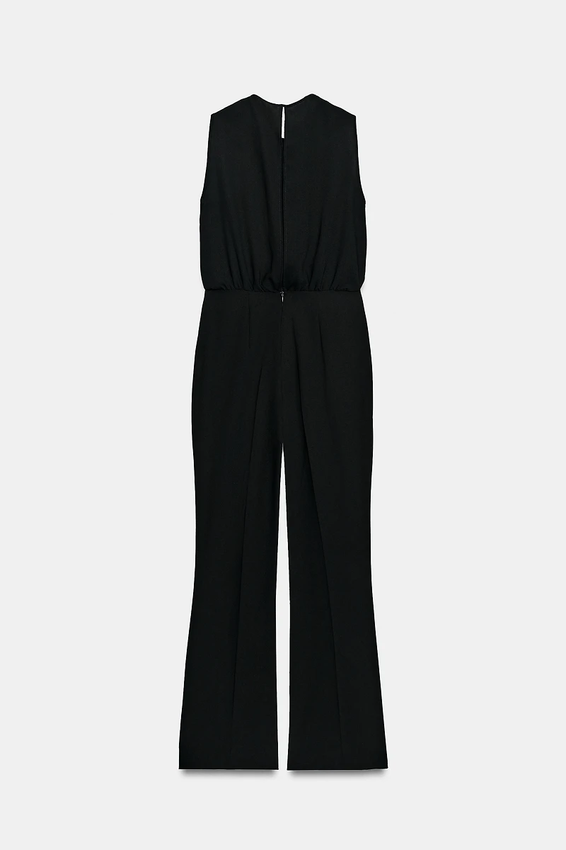 TWISTED NECK FLARE JUMPSUIT