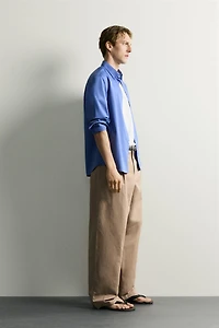 RELAXED FIT PLEATED PANTS