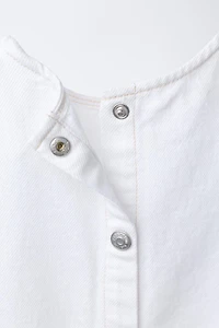 TOP EN DENIM À VOLANTS