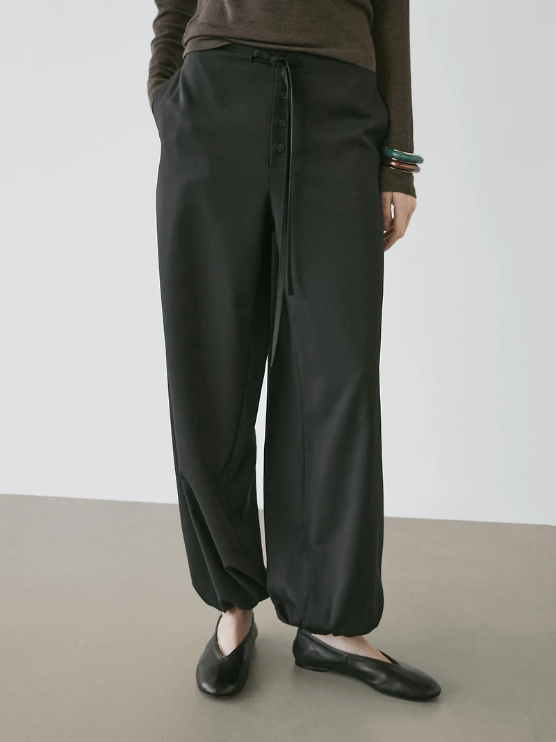 Pantalon bouffant en laine avec nœud