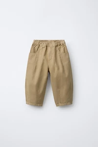 SOFT TOUCH PLEATED BAGGY PANTS