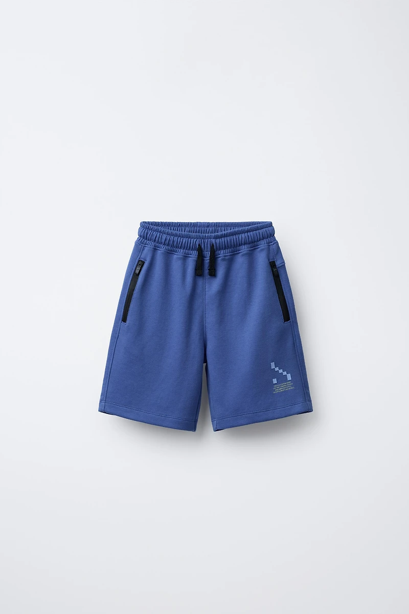 BERMUDA SPORTY POCHES