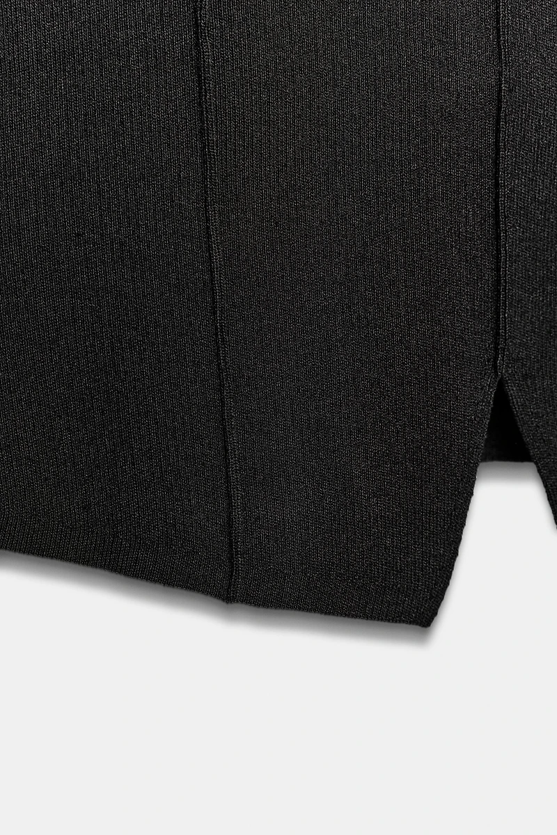 TOP EN MAILLE PÉPLUM