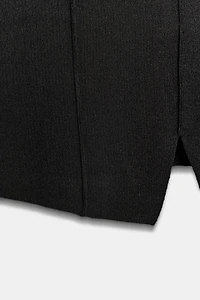 TOP EN MAILLE PÉPLUM