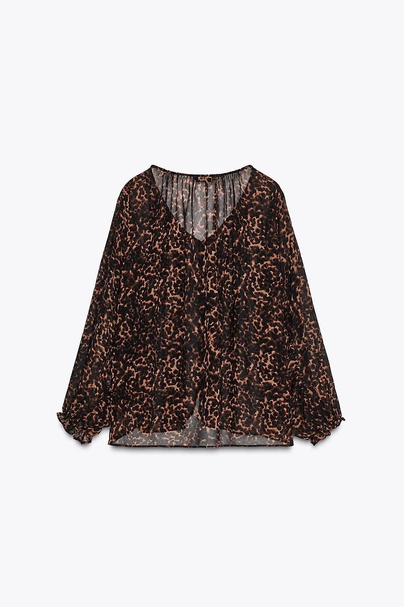 BLOUSE SEMI-TRANSPARENTE À IMPRIMÉ ANIMALIER