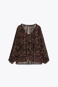 BLOUSE SEMI-TRANSPARENTE À IMPRIMÉ ANIMALIER