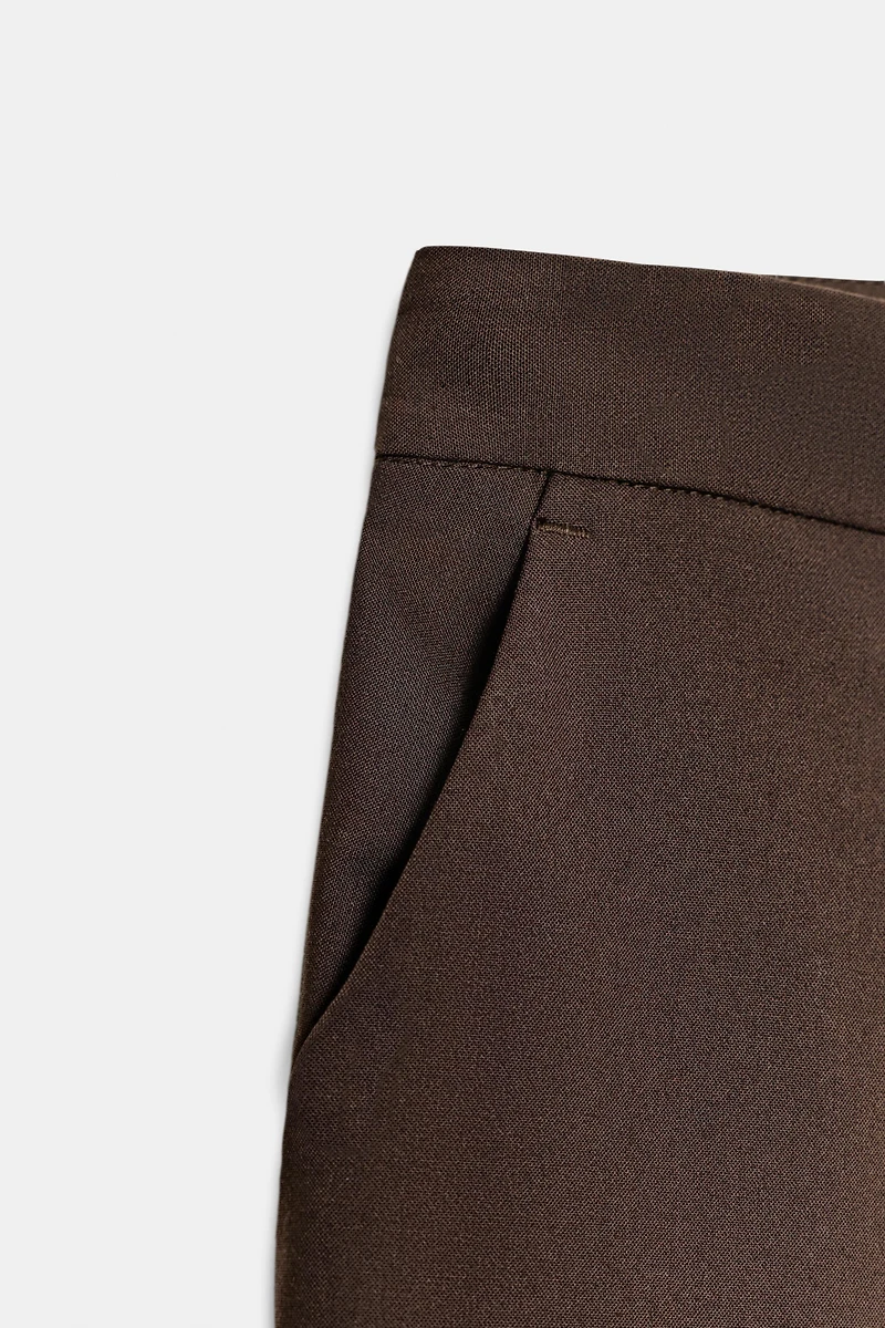 LONG PLEATED SHORTS