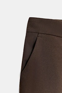 LONG PLEATED SHORTS