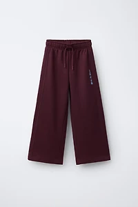 TEXT PRINT WIDE LEG PANTS