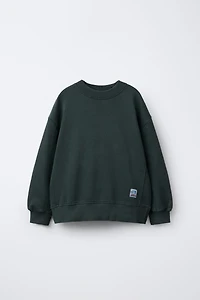 GARMENT DYE LABEL SWEATSHIRT