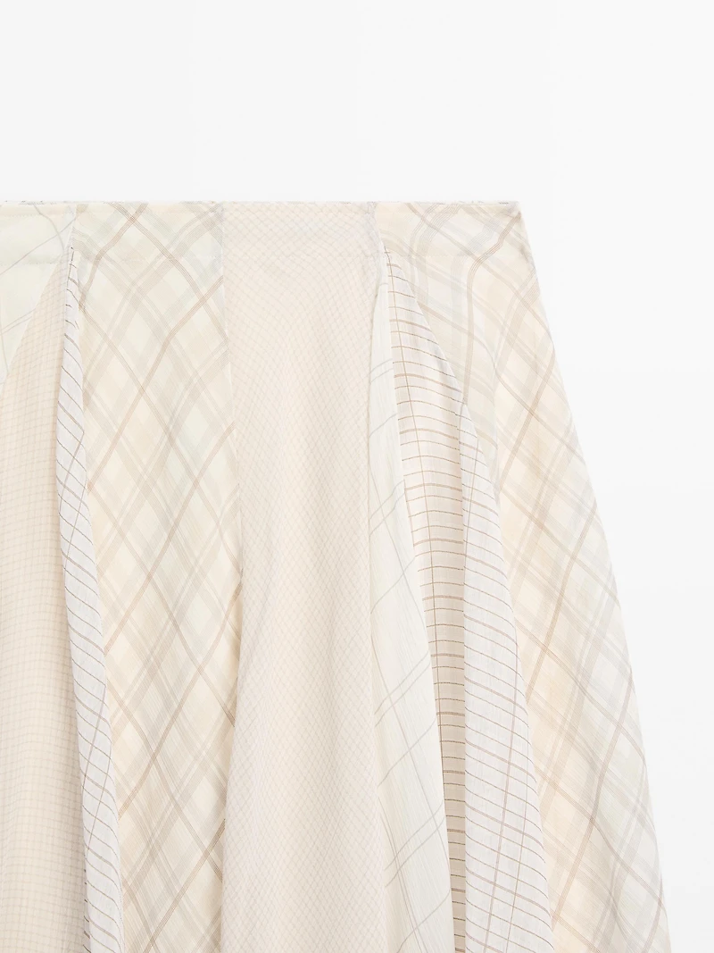 Jupe midi asymétrique à carreaux