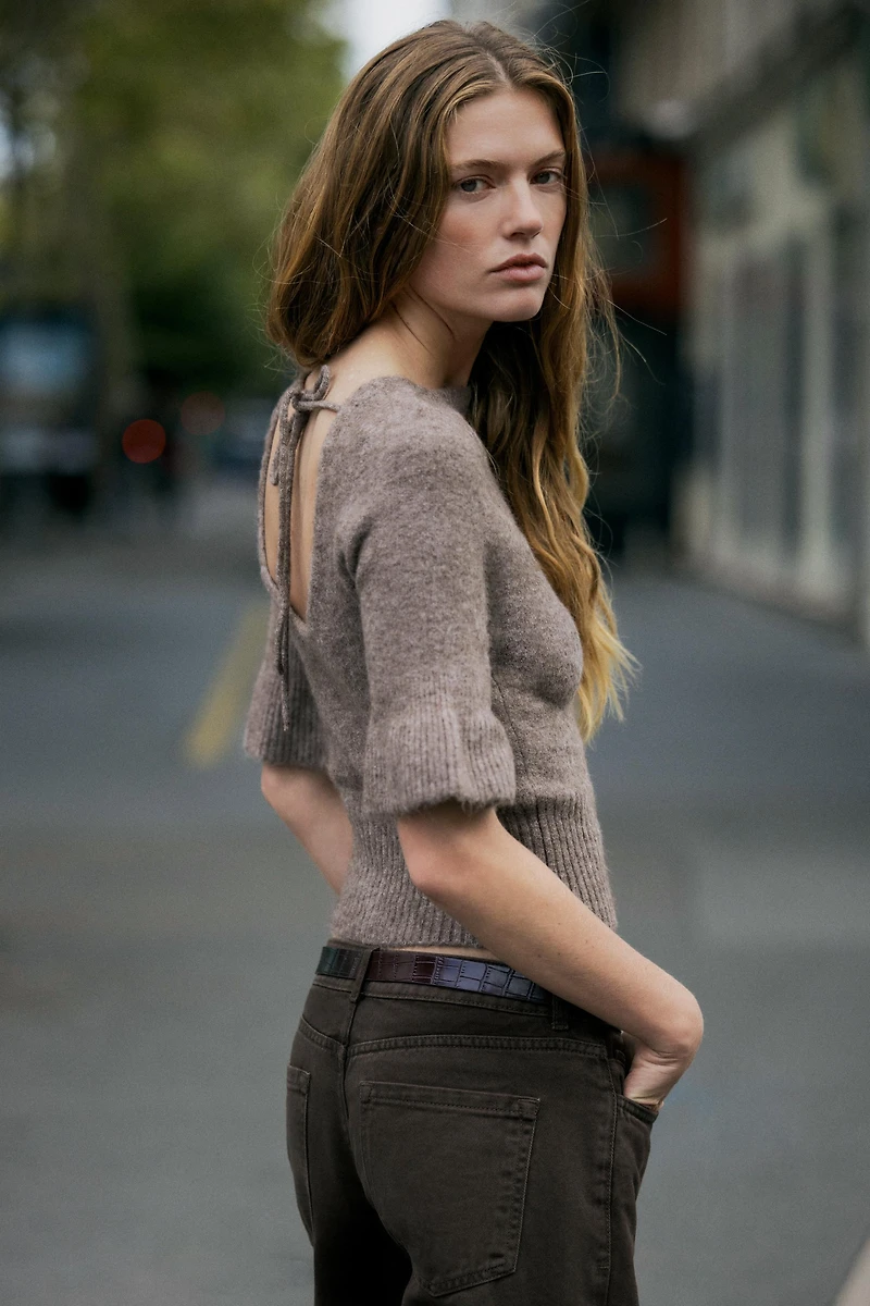 TOP EN MAILLE DOS NU