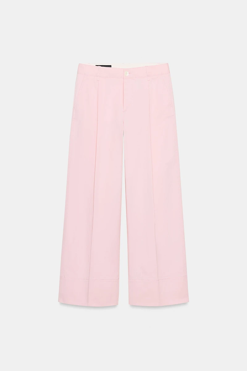 PLEATED CHINO PANTS