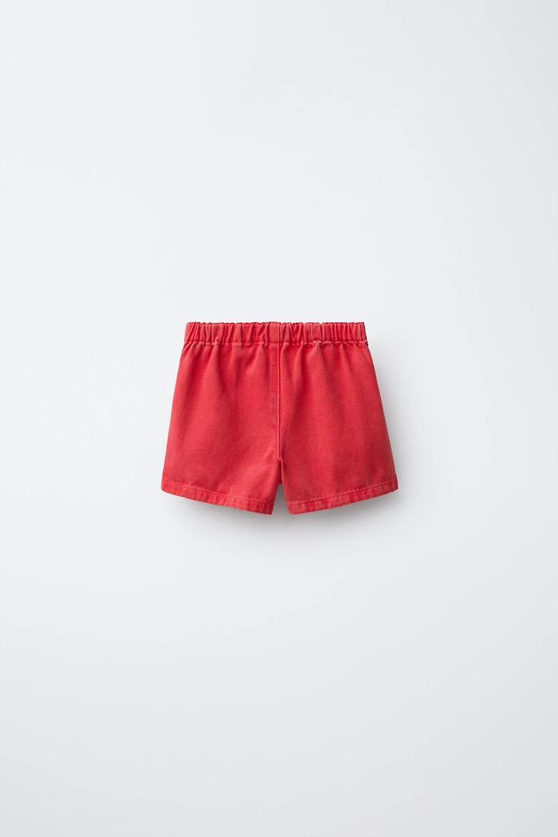JUPE-SHORT EN SERGÉ À LACETS