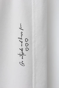 TEXT PRINT WIDE LEG PANTS