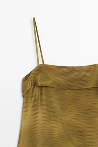 Asymmetric strappy top with draped detail