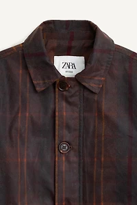 MANTEAU À CARREAUX CIRÉ ÉDITION LIMITÉE