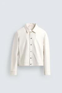 BLOUSON EN MATIÈRE SYNTHÉTIQUE BRILLANT