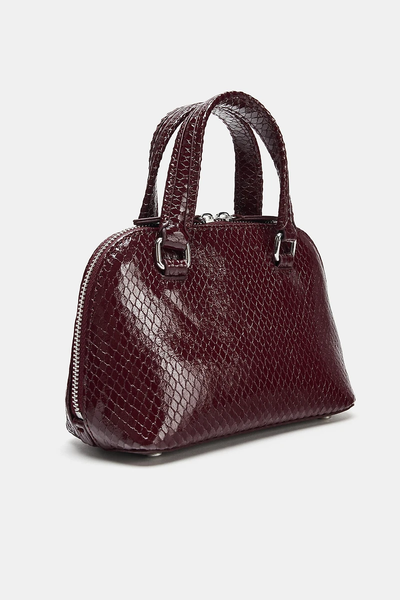 EMBOSSED MINI CITY BAG