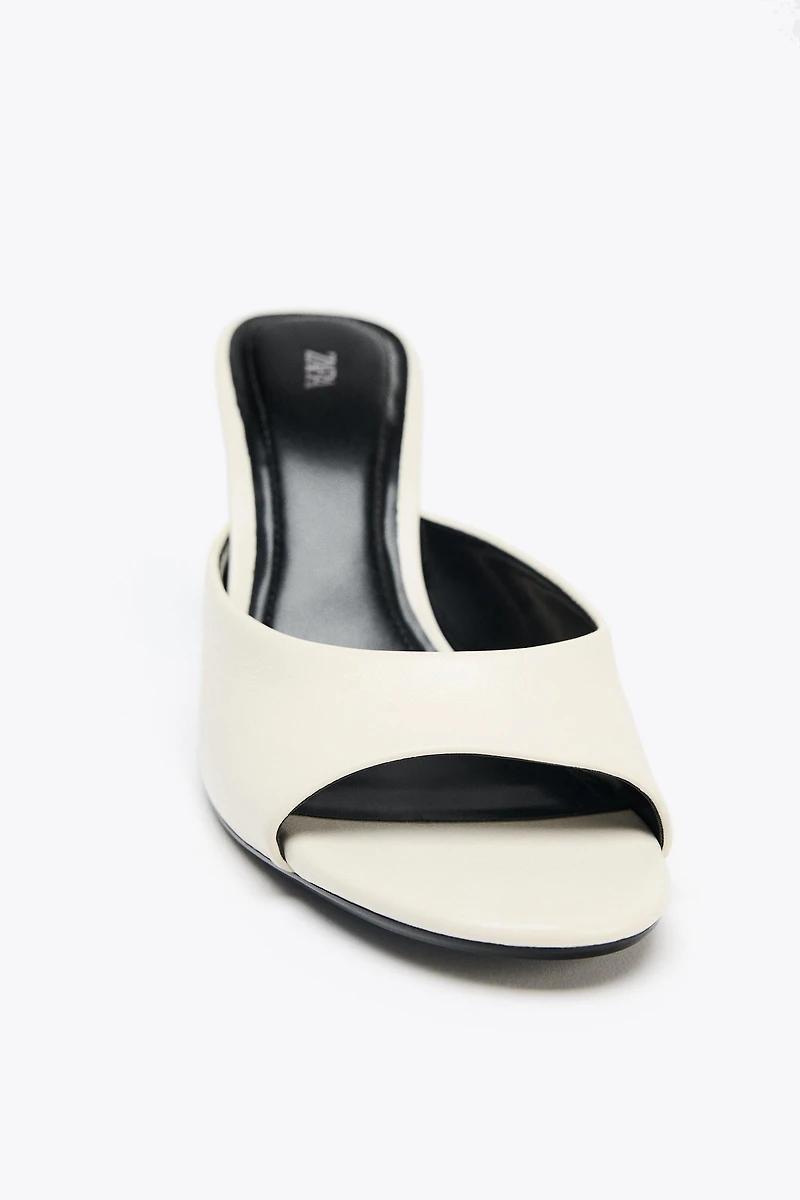 TRANSPARENT WEDGE LEATHER MULES