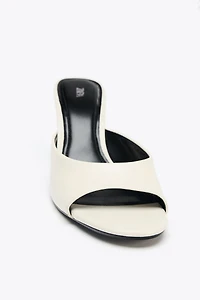 TRANSPARENT WEDGE LEATHER MULES