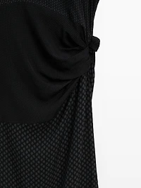 Long flowing printed dress with knot detail