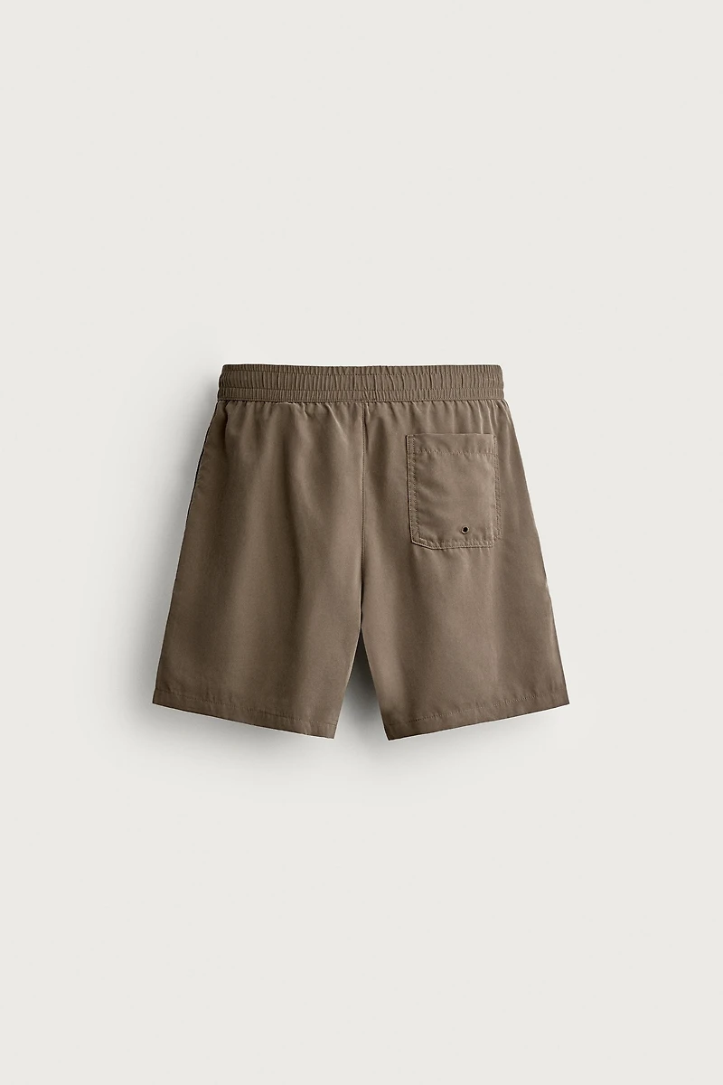BASIC LONG SWIM TRUNKS