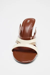 ASYMMETRIC HEELED SANDALS