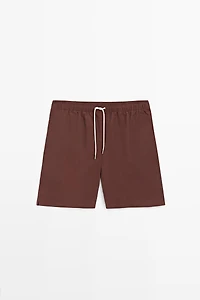 Solid Swim Trunks