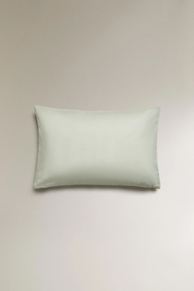 HOUSSE DE COUSSIN SURPIQÛRE