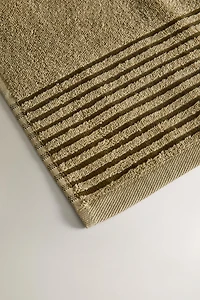 SERVIETTE DE BAIN FRISE CONTRASTANTE