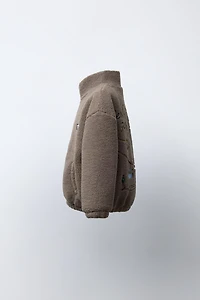 BLOUSON EFFET MOUTON BRODÉ