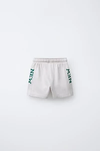 TEXT JOGGING SHORTS