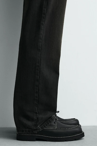 CHAUSSURES EN CUIR AVEC SURPIQÛRES