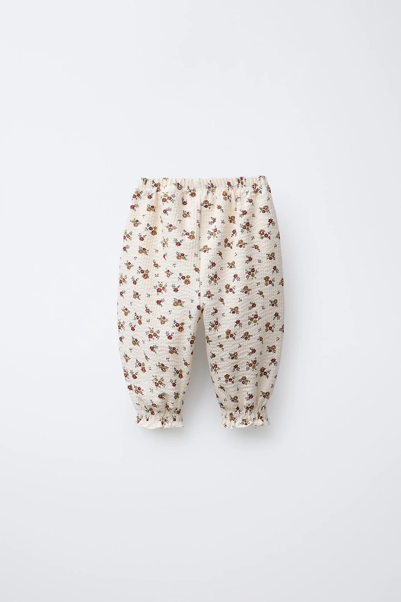 FLORAL EMBOSSED PANTS