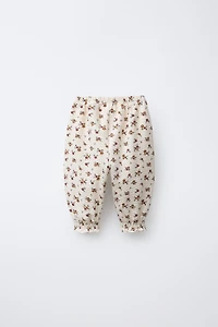 FLORAL EMBOSSED PANTS