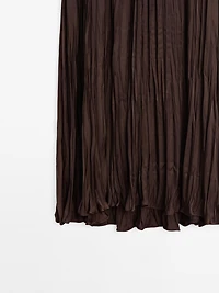 Long flowing pleated skirt