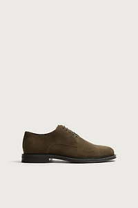 CHAUSSURES EN CUIR