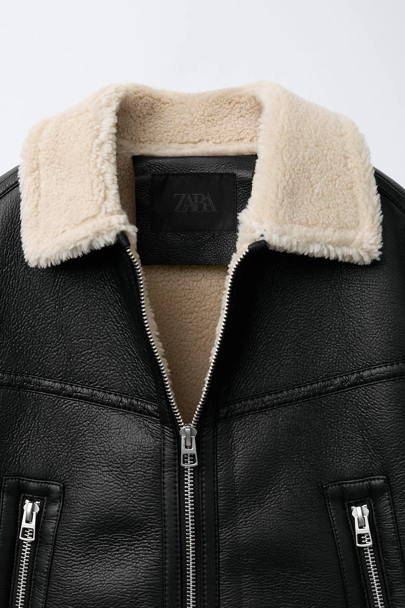 DOUBLE FACED FAUX LEATHER SHEARLING JACKET