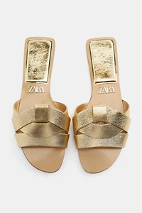 FLAT CROSSED LEATHER SANDALS