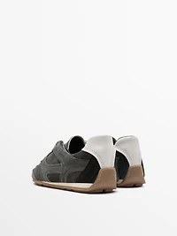 Tennis cuir contrastant